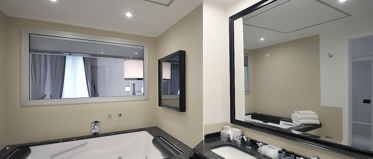 premium bedding, down duvets, minibar, in-room safe