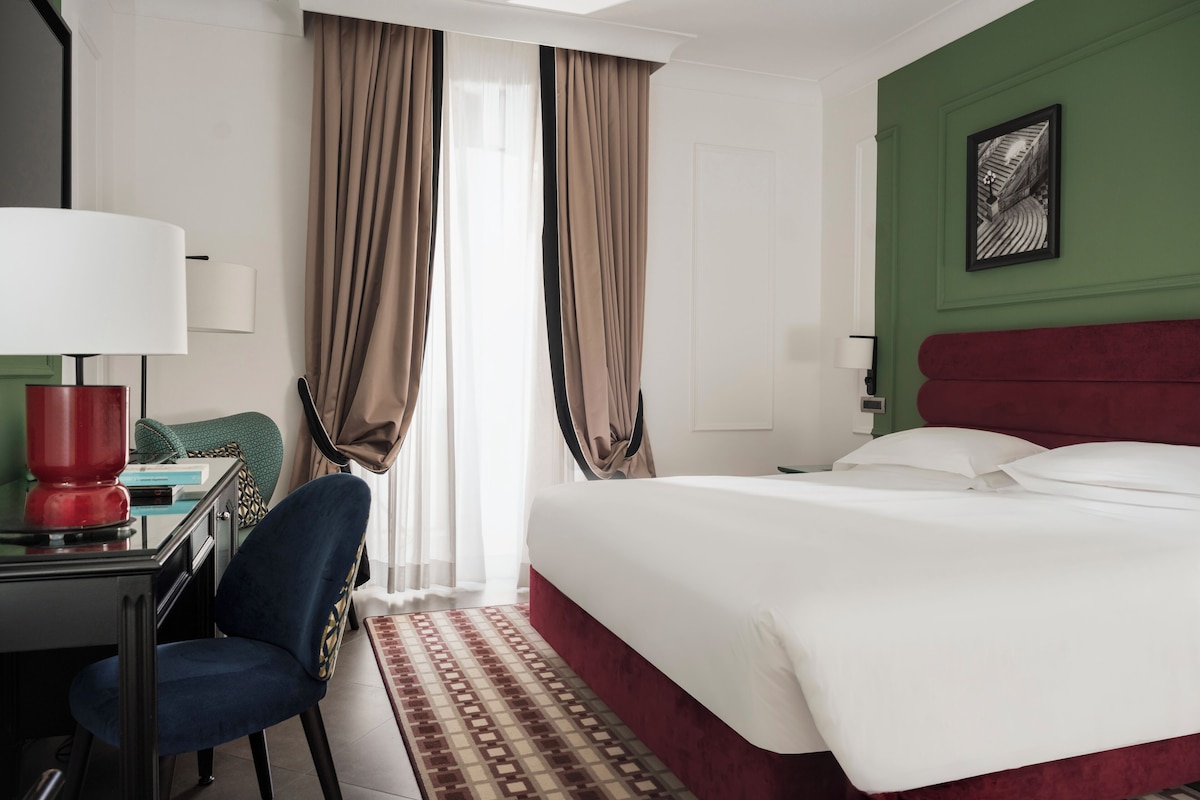Premium bedding, down comforters, minibar, in-room safe