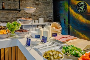 Daily buffet breakfast (EUR 14 per person)