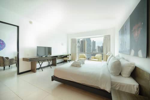 Suíte júnior, 1 cama King, vista para o oceano | Roupas de cama premium, cofres nos quartos, escrivaninha
