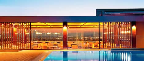 Seasonal outdoor pool, pool umbrellas, pool loungers