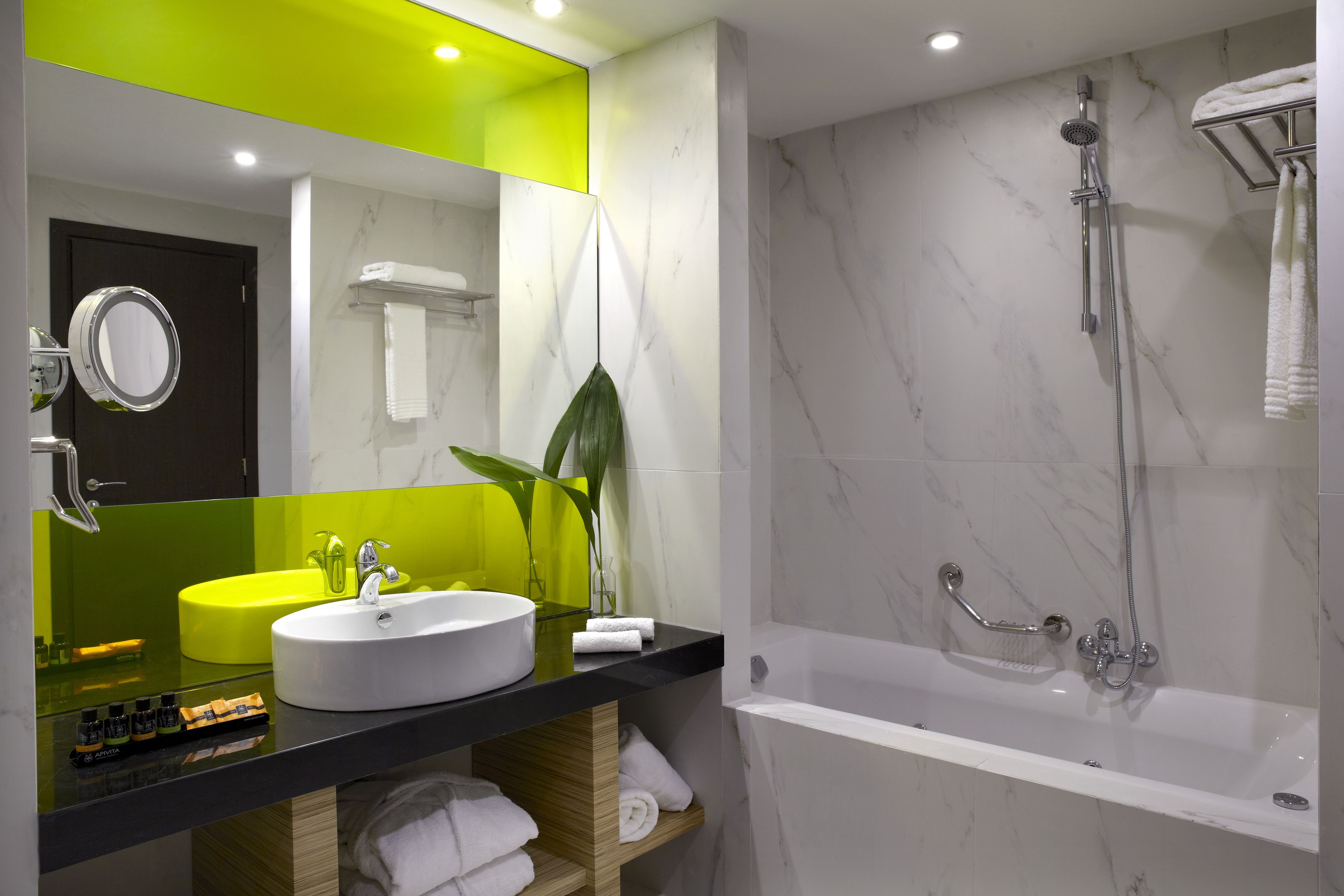 deep-soaking bathtub, eco-friendly toiletries, hair dryer, bathrobes