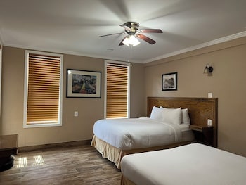 Traditional Room, 2 Queen Beds | Iron/ironing board, free WiFi, bed sheets at District Hotel