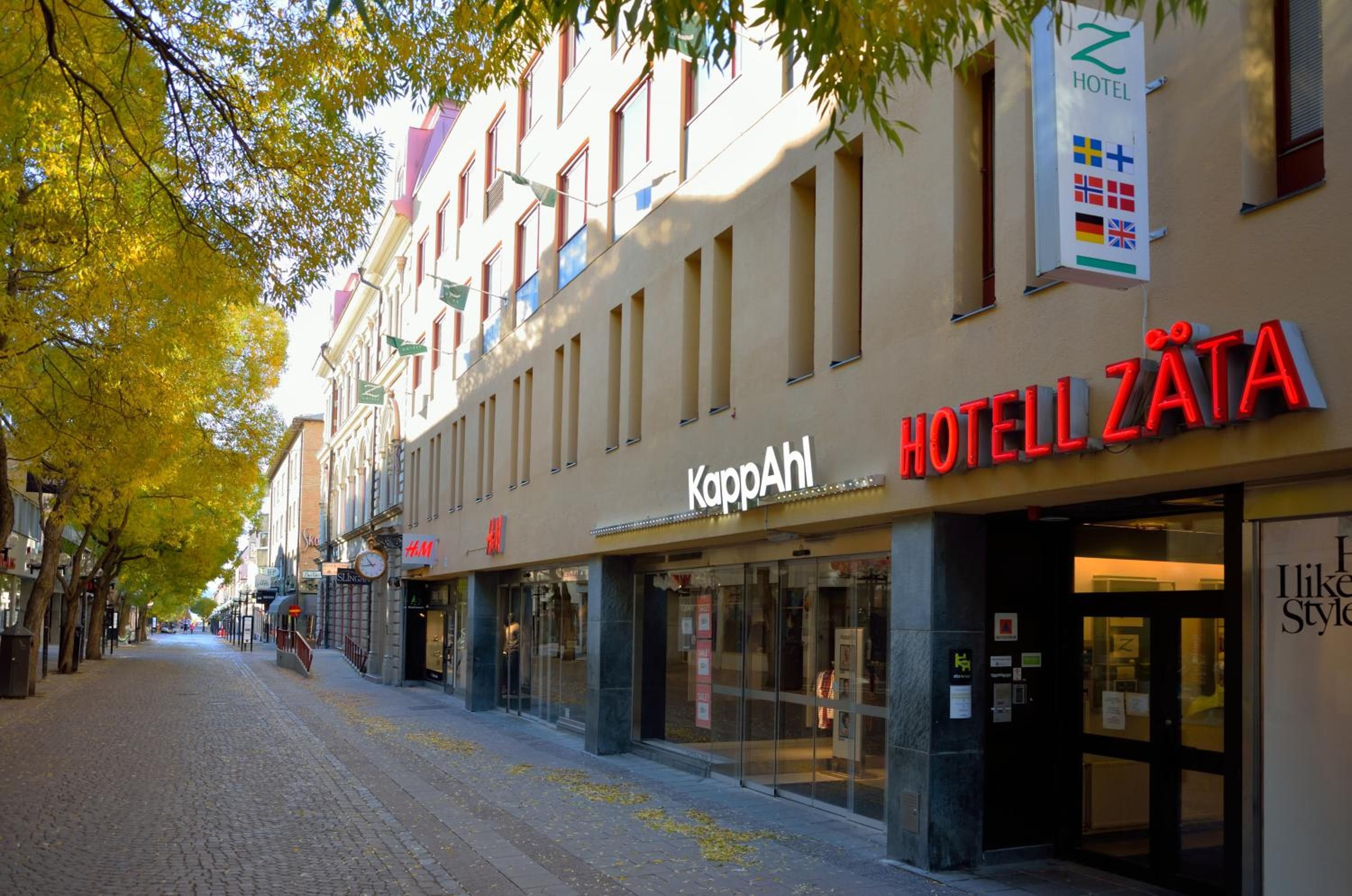 A hotel named 'HOTEL ZATA' with a visible storefront and signage.