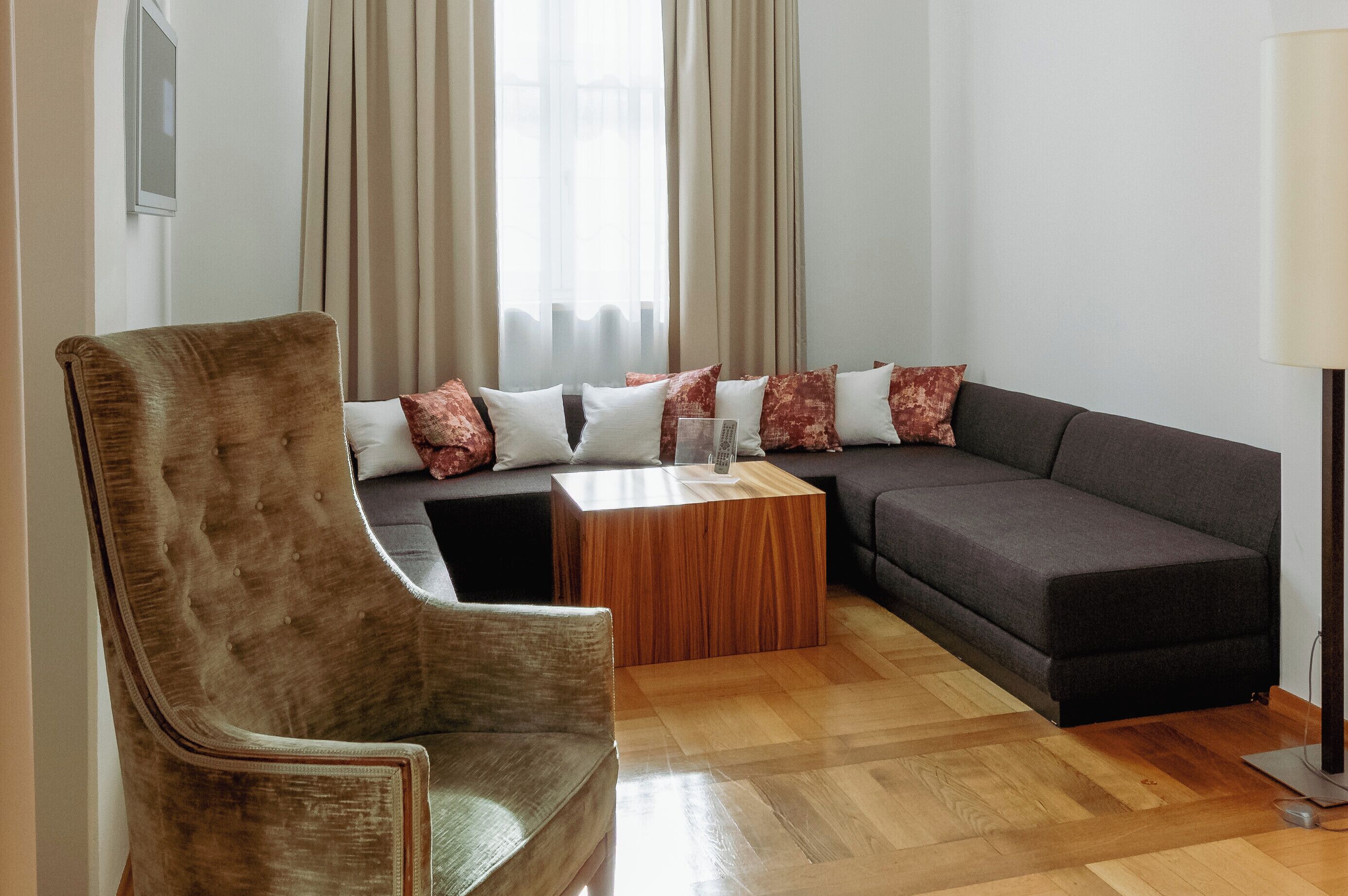 Presidential Suite | Living area | 24-inch flat-screen TV with satellite channels, TV