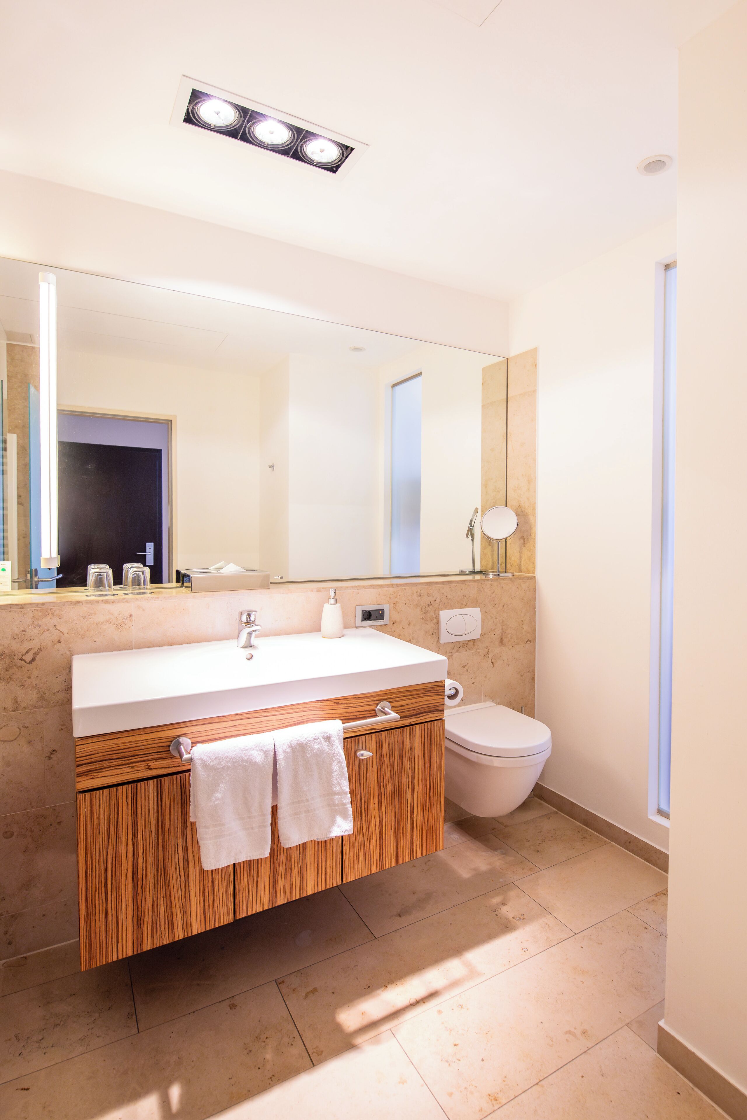 eco-friendly toiletries, hair dryer, towels, soap