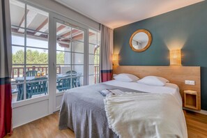 Appartement, 2 slaapkamers, balkon | Een strijkplank/strijkijzer, babybedden (toeslag), beddengoed