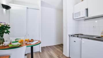 Fridge, microwave, electric kettle, cookware/dishes/utensils