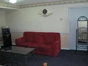 Suite, 1 King Bed, Non Smoking | Living room | Flat-screen TV - Parsippany Inn and Suites Morris Plains (Morris Plains)