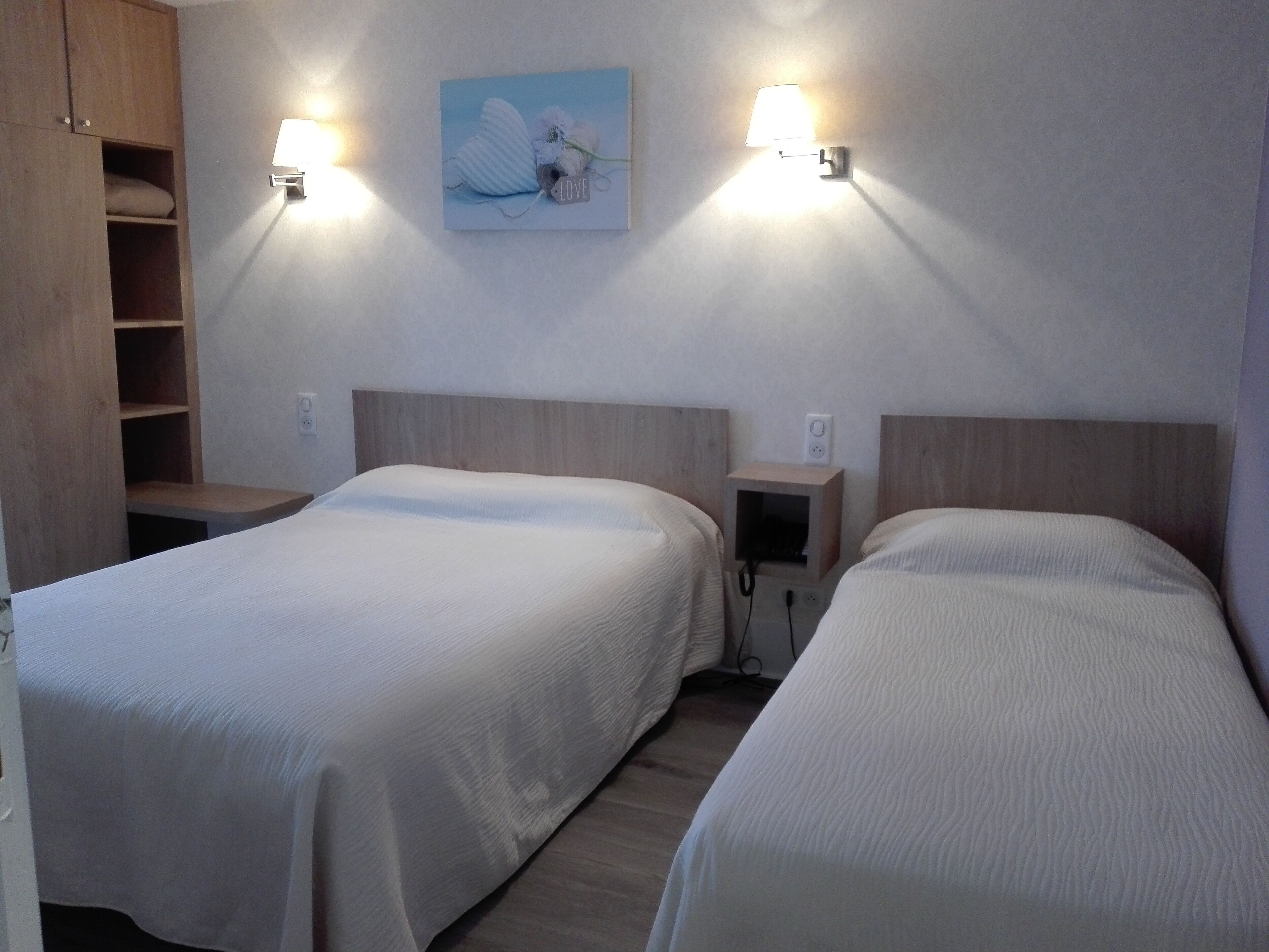 family suite | 2 bedrooms, individually decorated, desk, blackout curtains