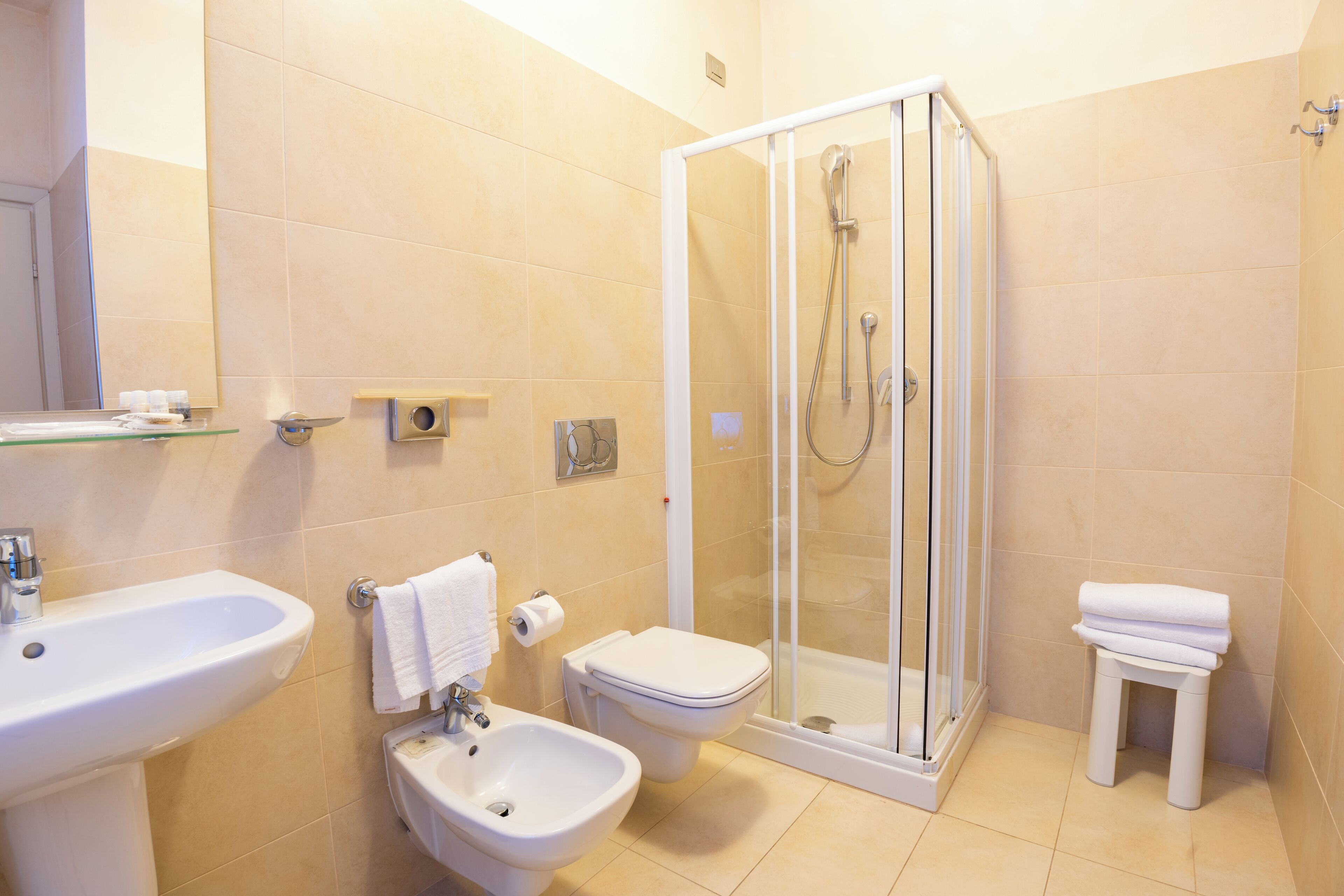 standard triple room, garden view | bathroom | rainfall showerhead, hair dryer, bidet, towels