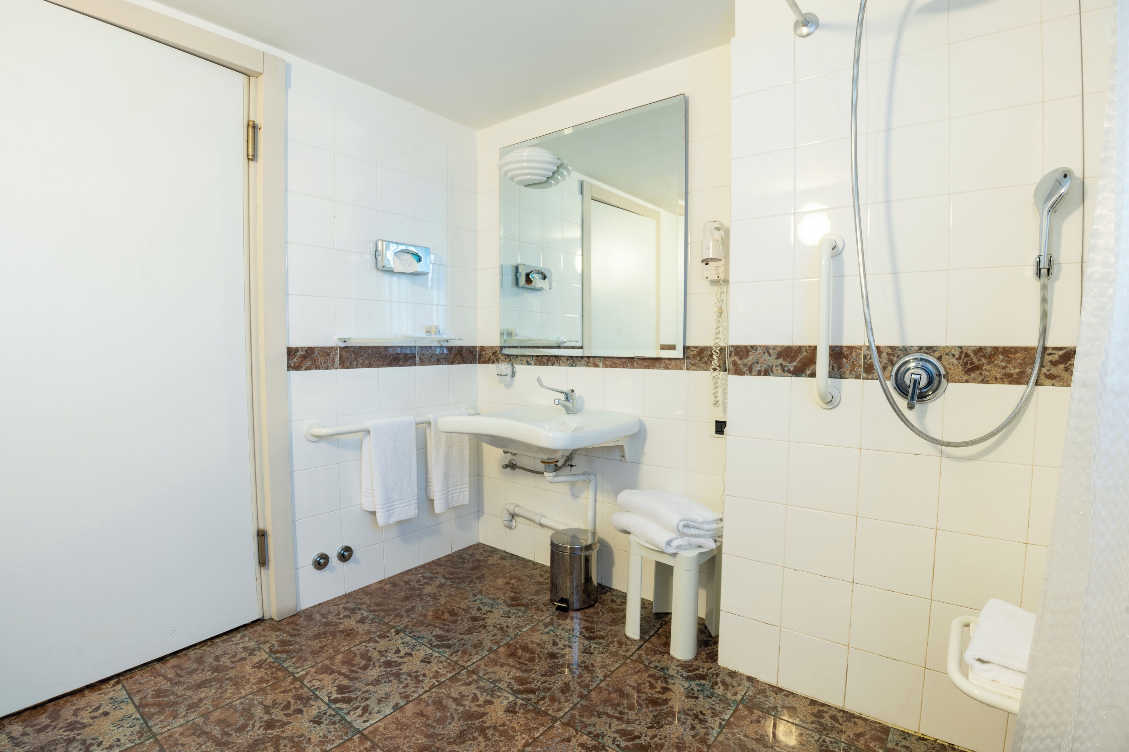 standard double room | bathroom | rainfall showerhead, hair dryer, bidet, towels