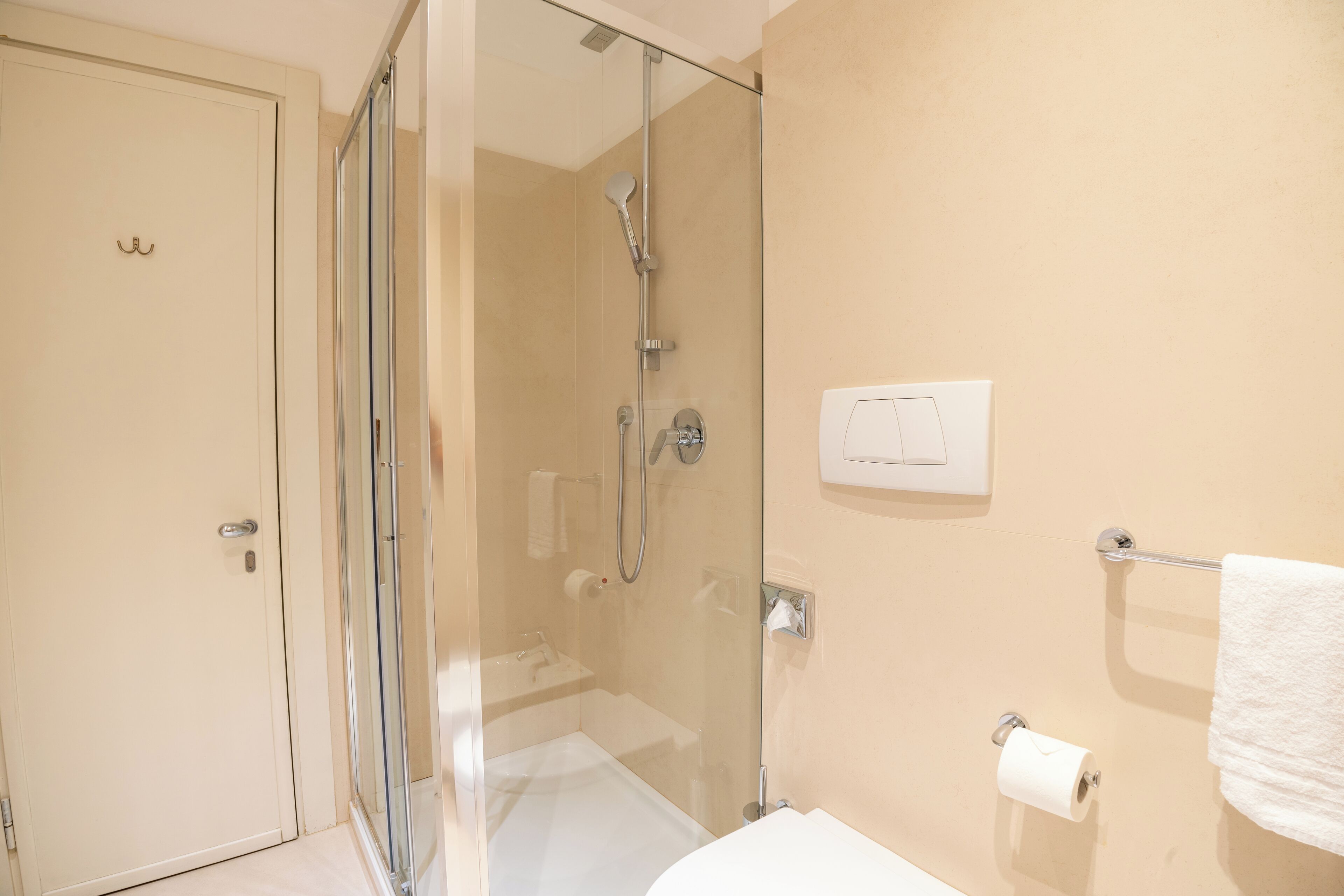 superior single room | bathroom | rainfall showerhead, hair dryer, bidet, towels