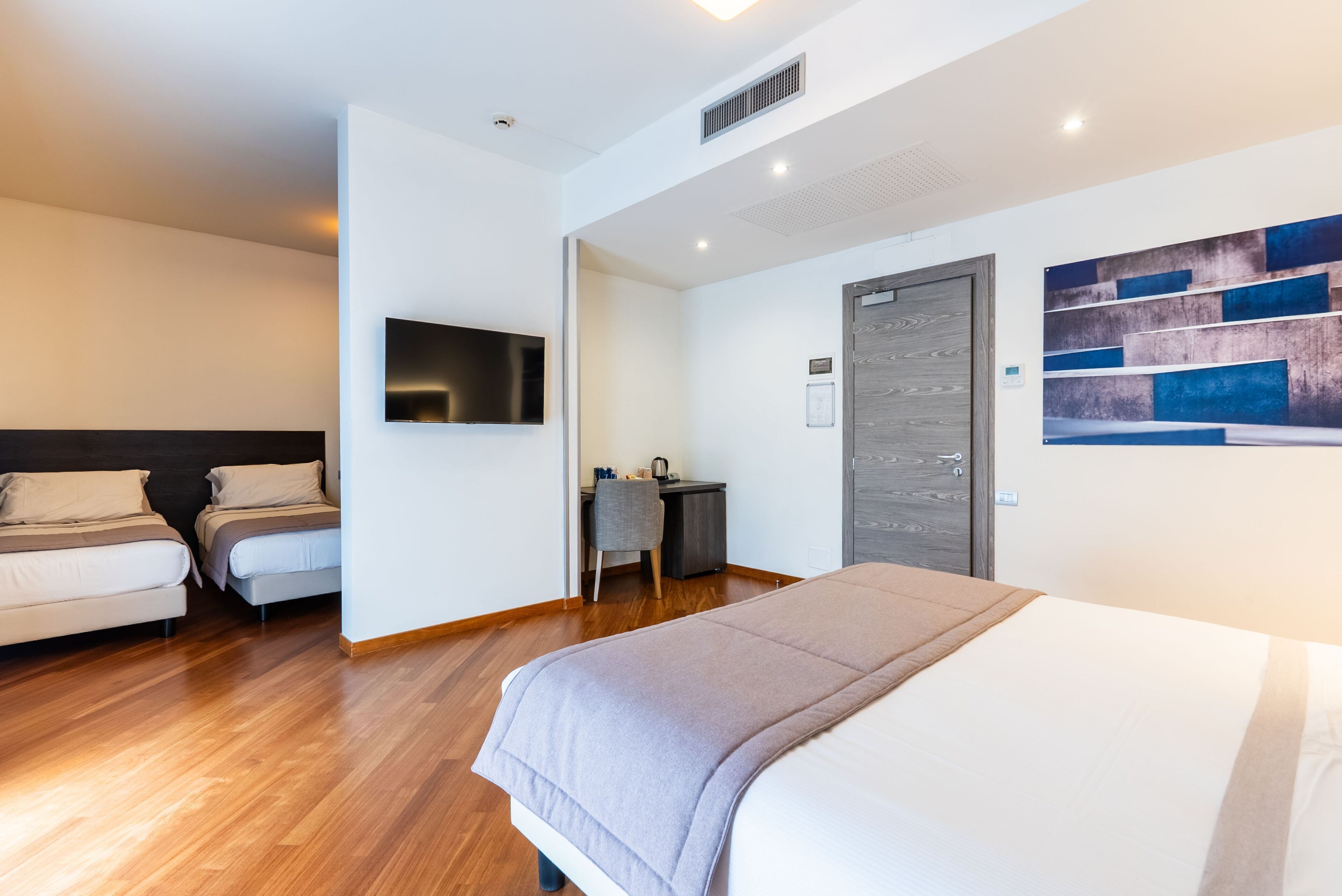 superior quadruple room, 1 bedroom | down duvets, minibar, in-room safe, desk