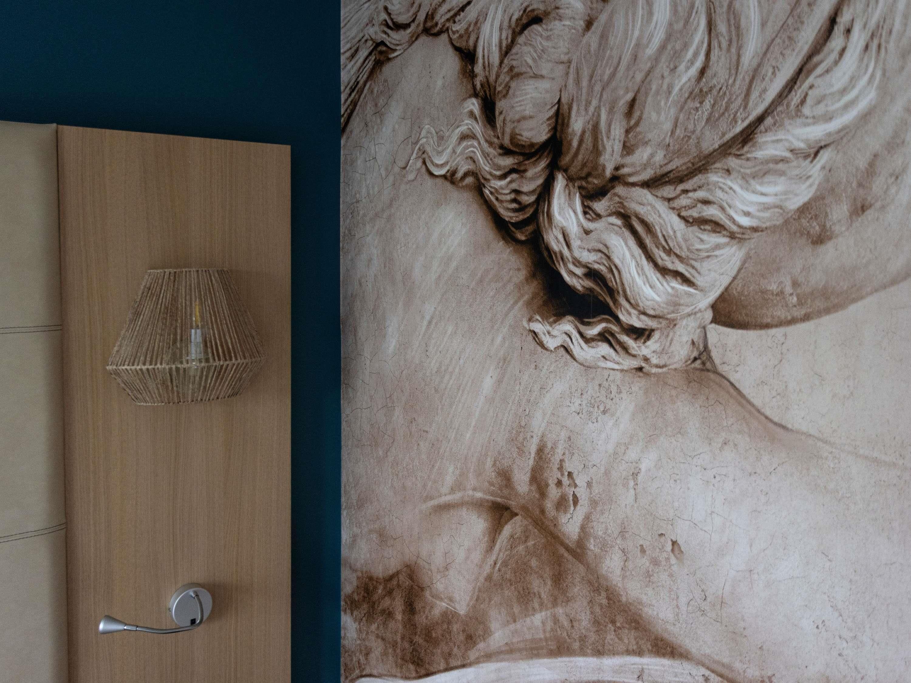 Desk, blackout drapes, soundproofing, free cribs/infant beds