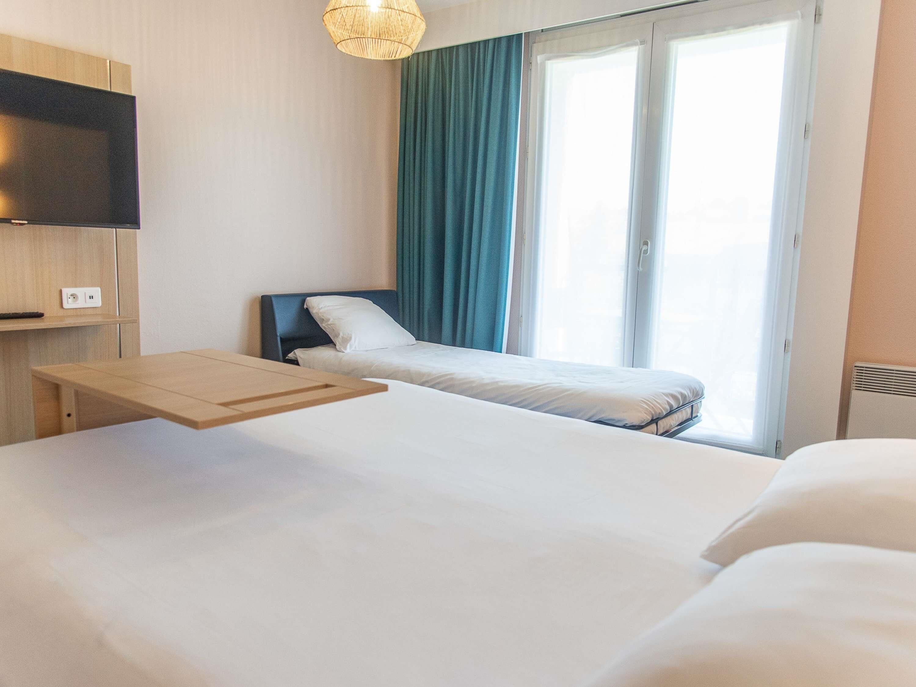 Standard Room, Multiple Beds | Desk, blackout drapes, soundproofing, free cribs/infant beds
