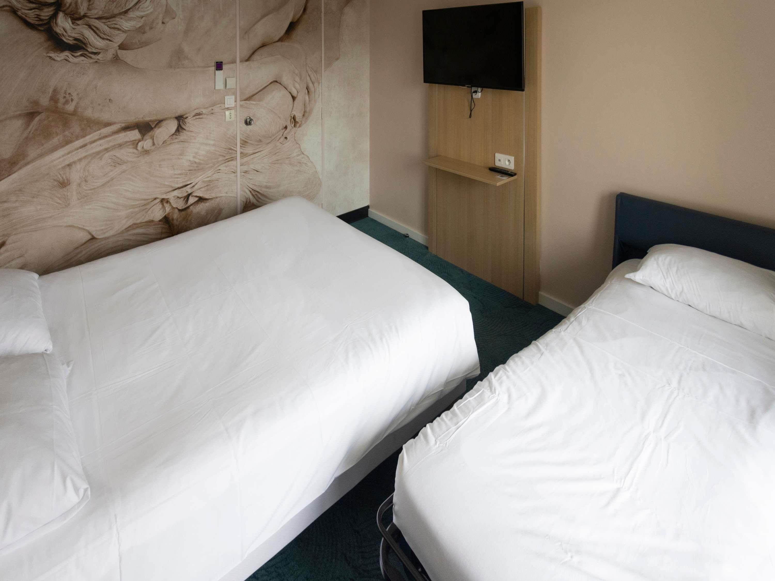 Standard Room, Multiple Beds | Desk, blackout drapes, soundproofing, free cribs/infant beds
