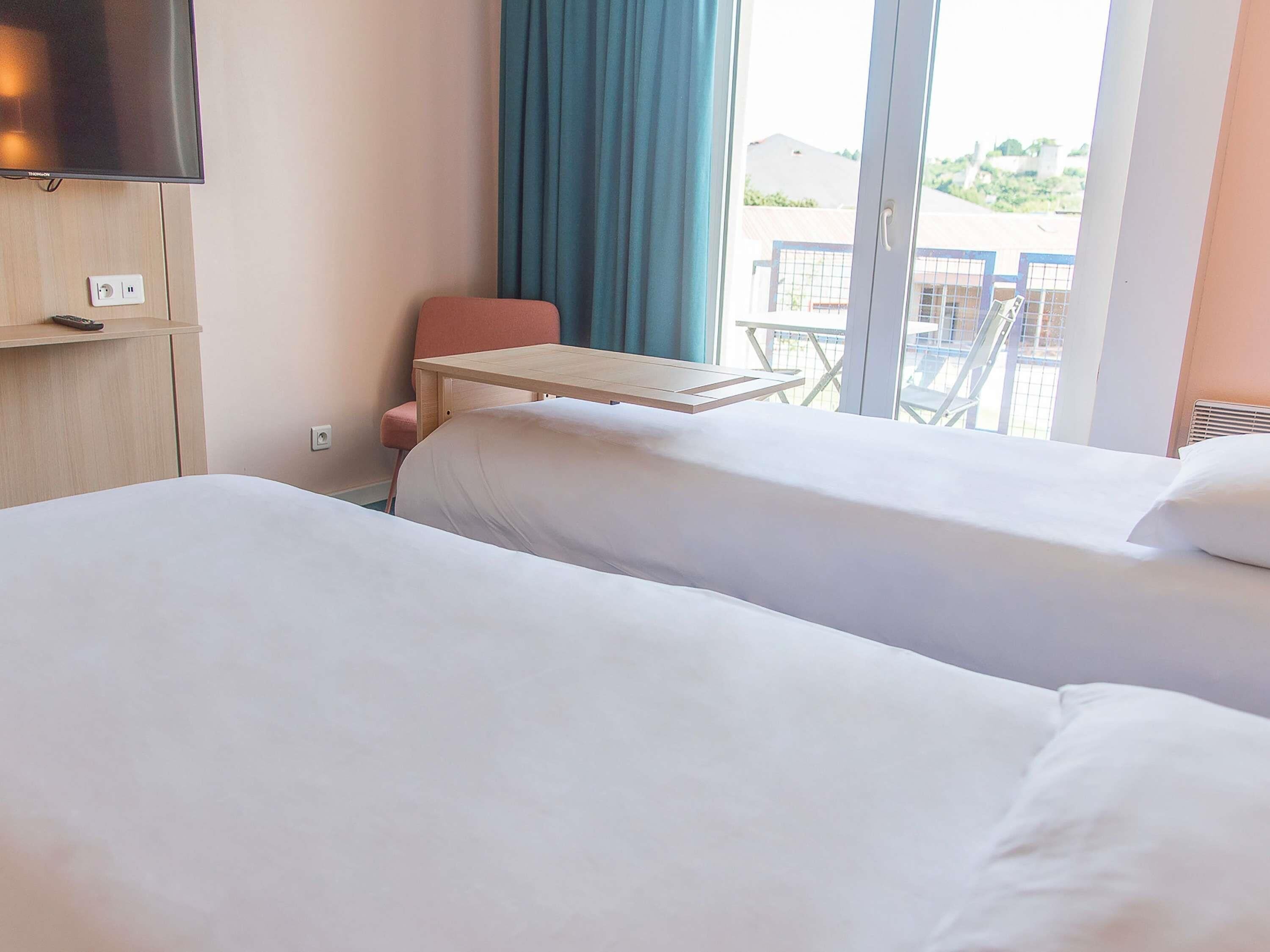 Standard Twin Room, 2 Twin Beds | Desk, blackout drapes, soundproofing, free cribs/infant beds