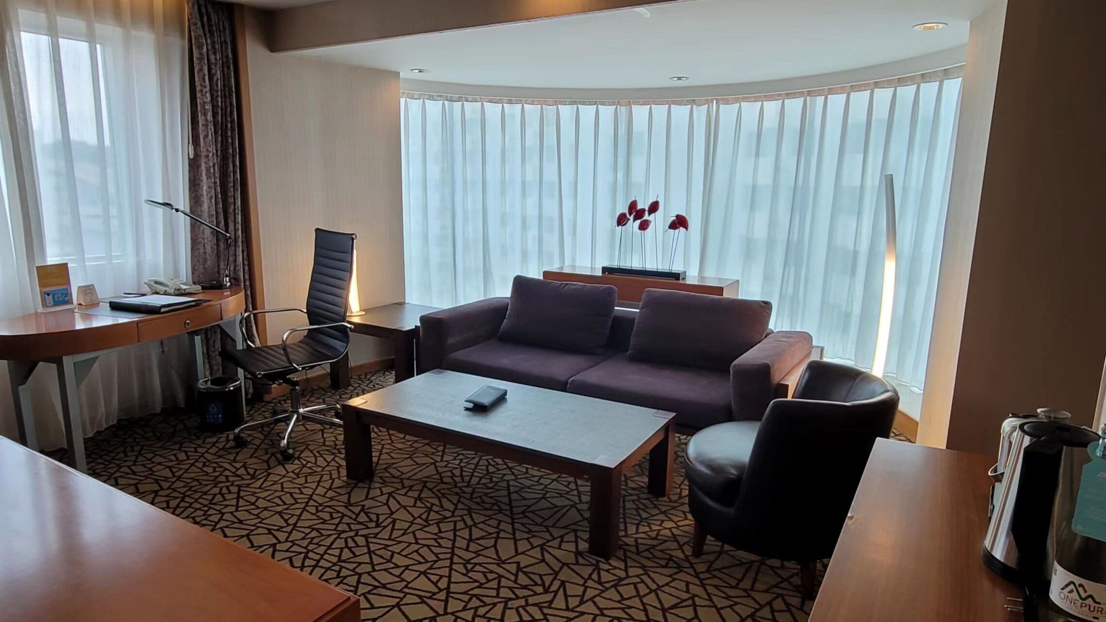 junior suite | living area | 50-inch lcd tv with cable channels, tv