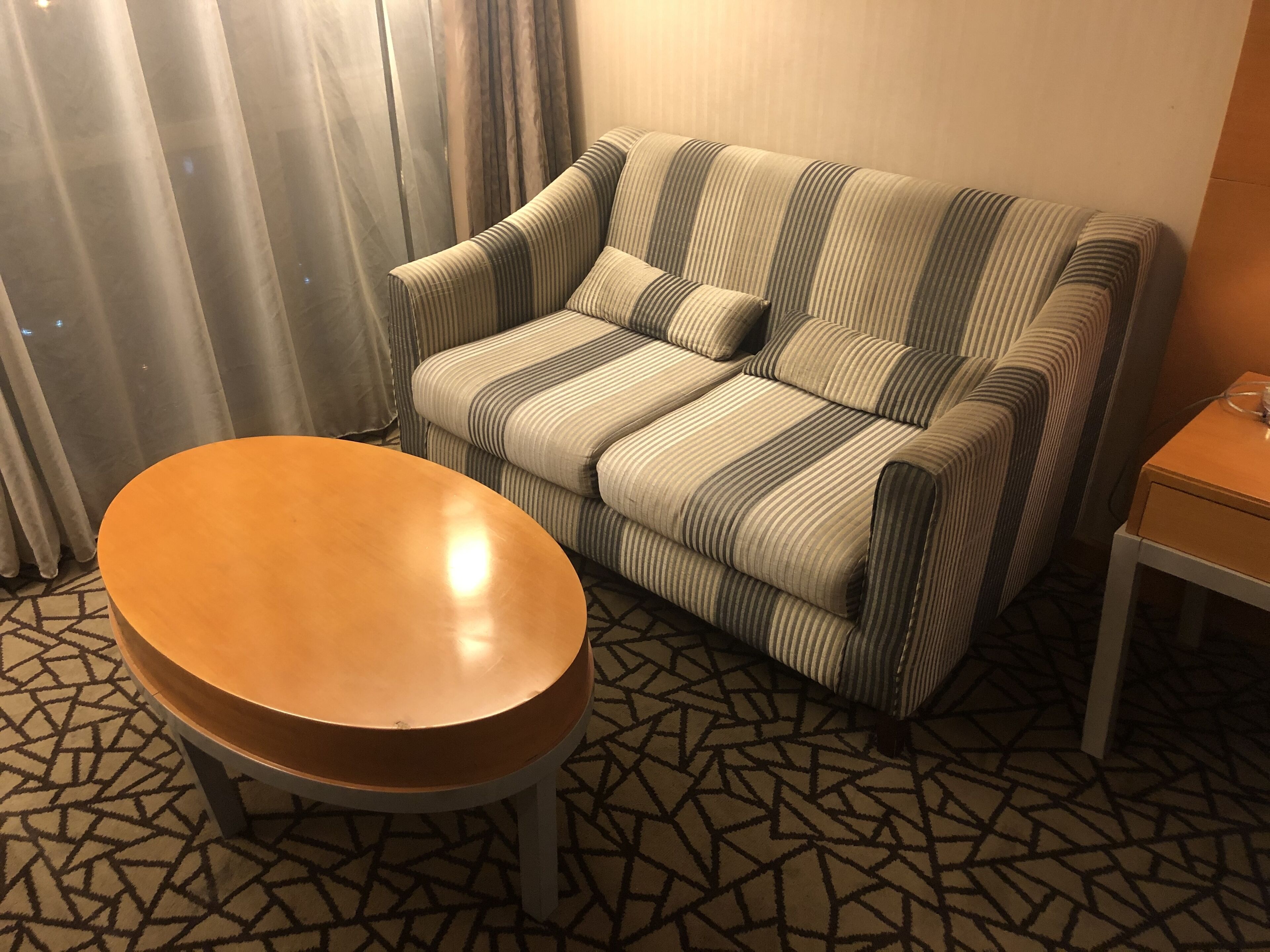 deluxe room | living area | 50-inch lcd tv with cable channels, tv