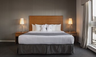 Premium bedding, down comforters, pillowtop beds, minibar
