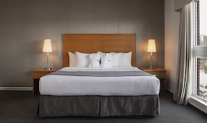 Premium bedding, down comforters, pillowtop beds, minibar