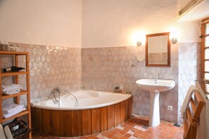 Suite, 2 Double Beds, Non Smoking | Bathroom | Deep-soaking bathtub, hair dryer, towels