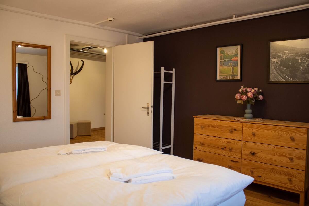 standard apartment | in-room safe, desk, laptop workspace, blackout curtains