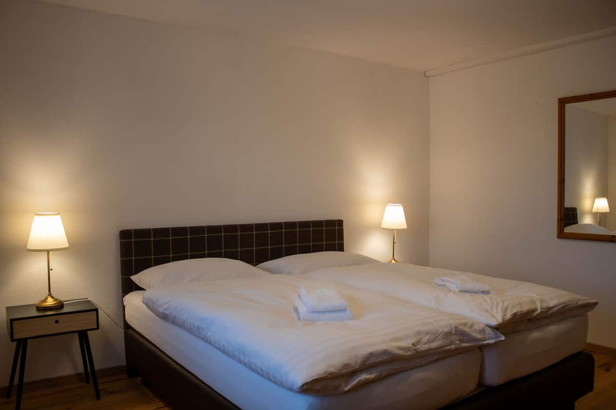 standard apartment | in-room safe, desk, laptop workspace, blackout curtains