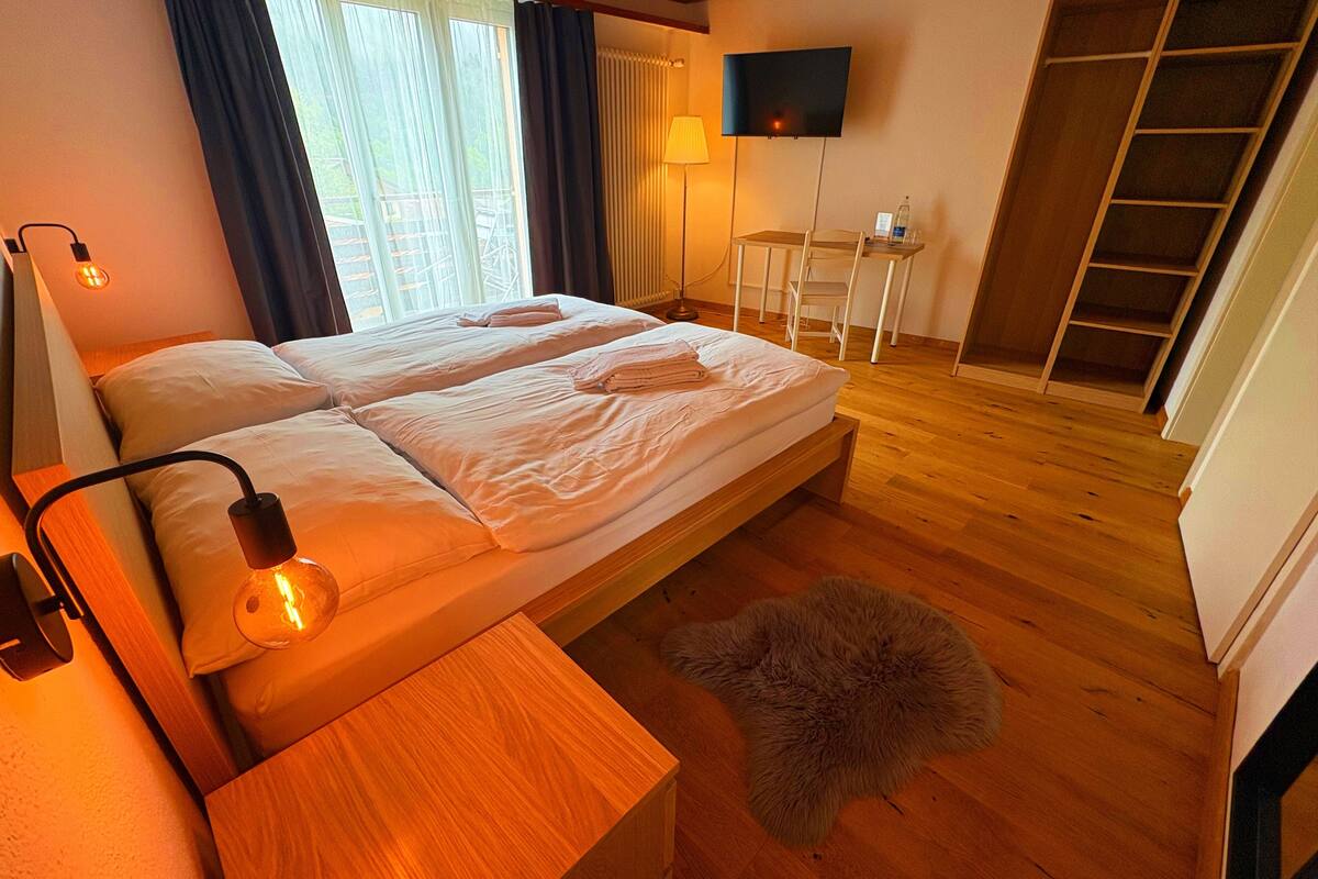 economy double room | in-room safe, desk, laptop workspace, blackout curtains