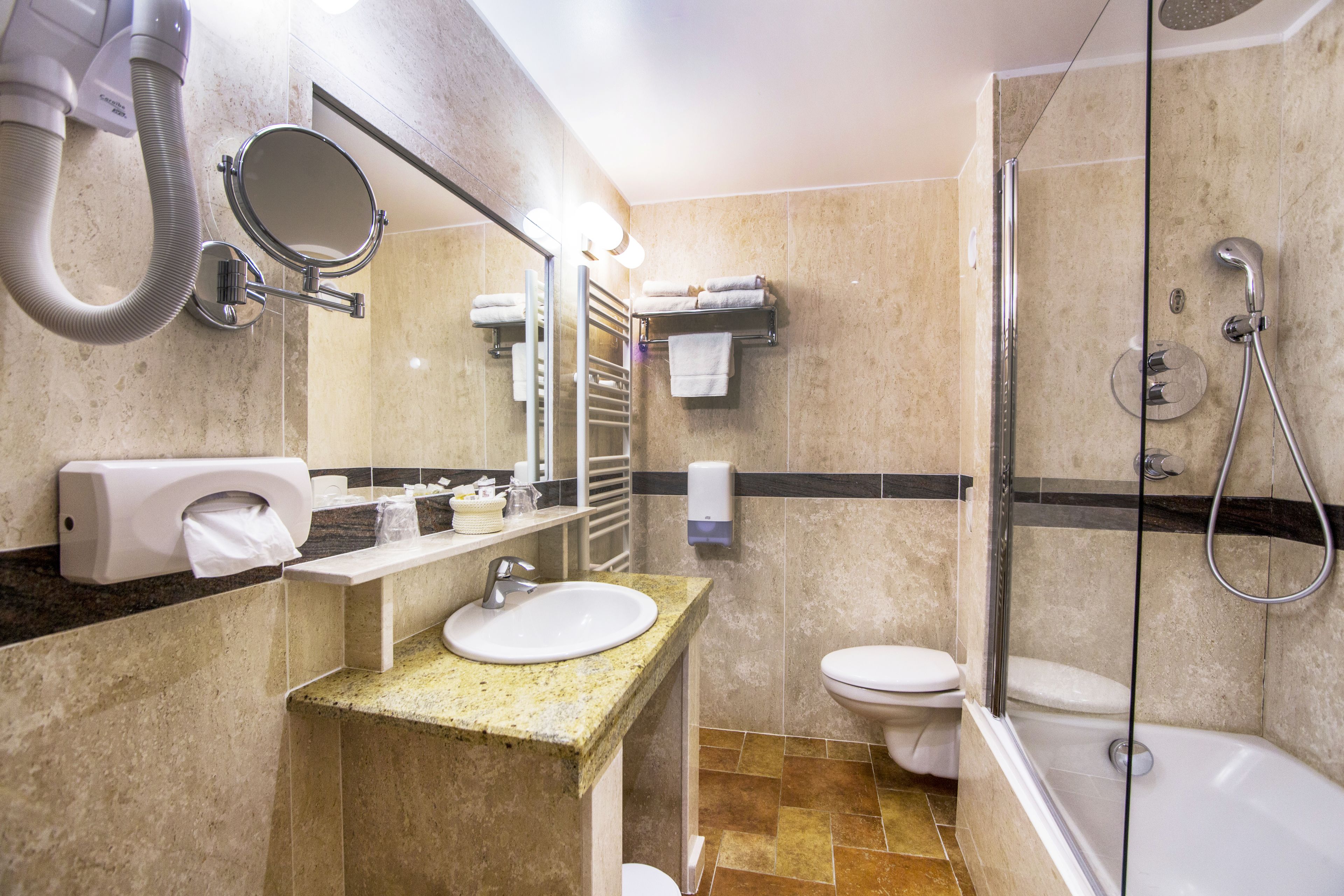 hair dryer, towels, shampoo