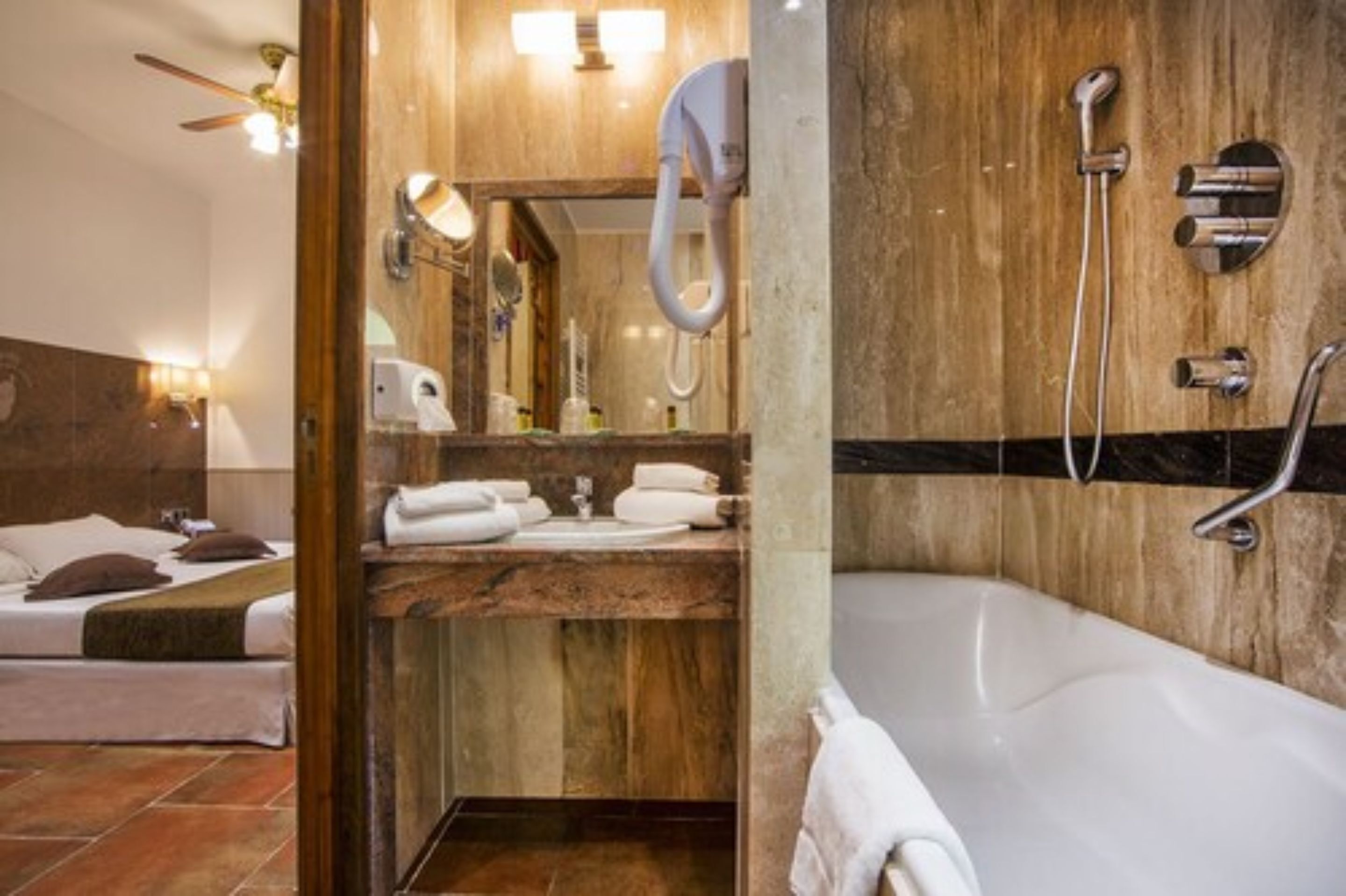 quadruple room | bathroom | hair dryer, towels, shampoo