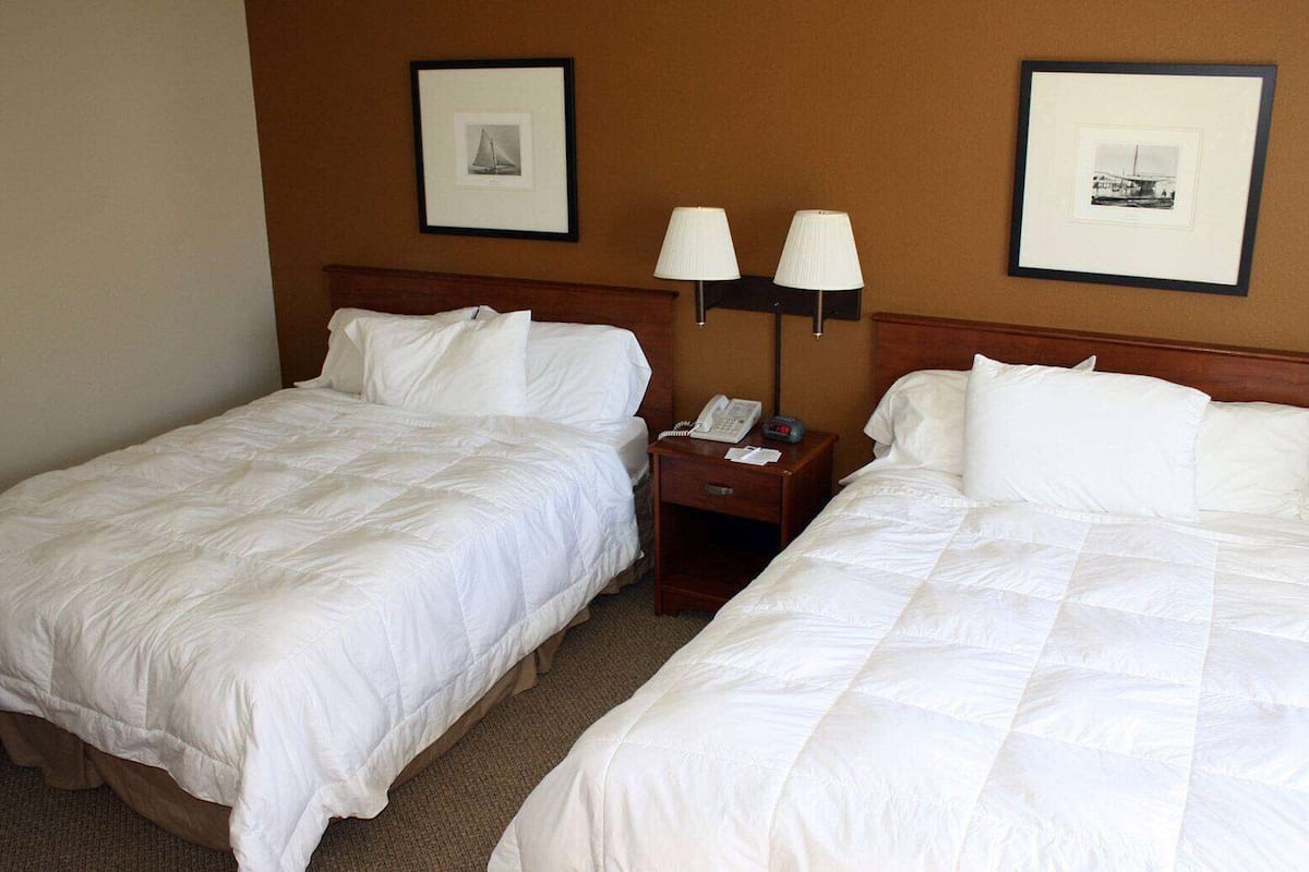 room, 2 queen beds, non smoking | in-room safe, desk, blackout curtains, iron/ironing board