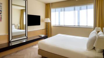 Luxe beddengoed, donsdekens, Tempur Pedic-bedden, een minibar