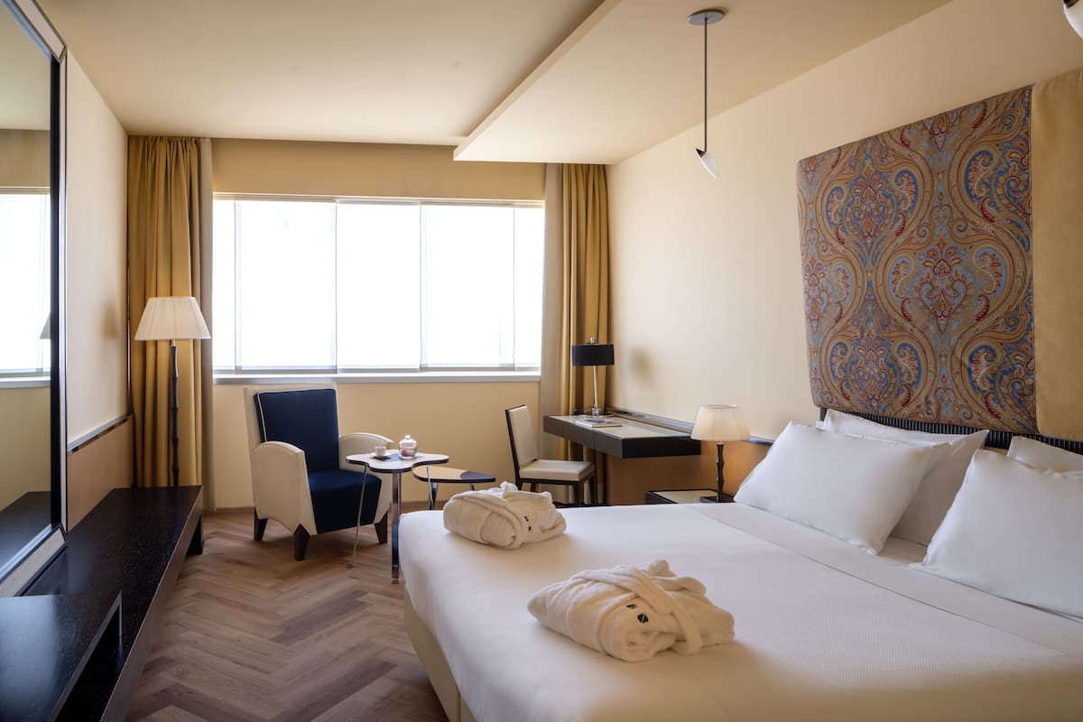 Hochwertige Bettwaren, Daunenbettdecken, Tempur-Pedic-Betten, Minibar