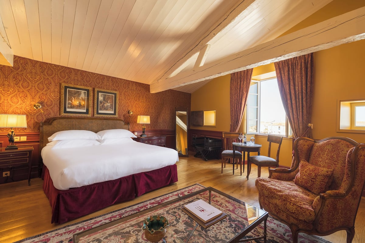 Premium bedding, memory-foam beds, free minibar items, in-room safe