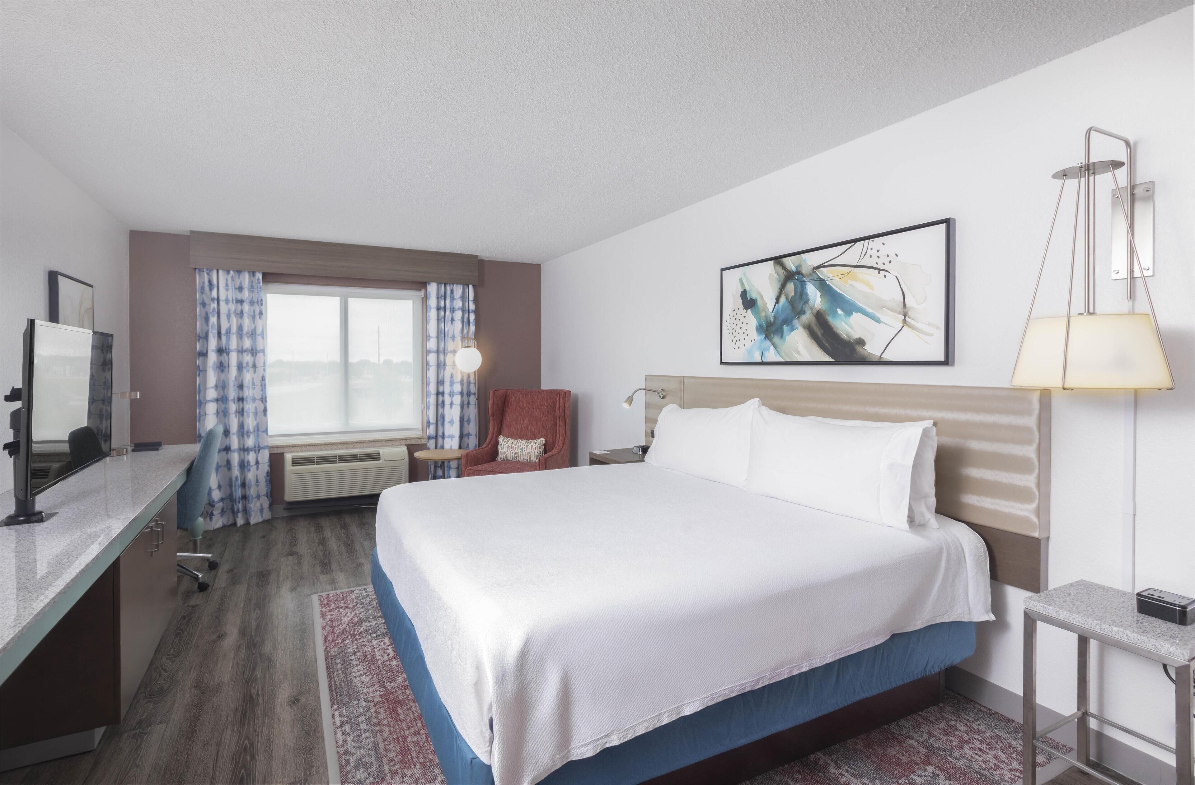 Desk, blackout drapes, iron/ironing board, free cribs/infant beds