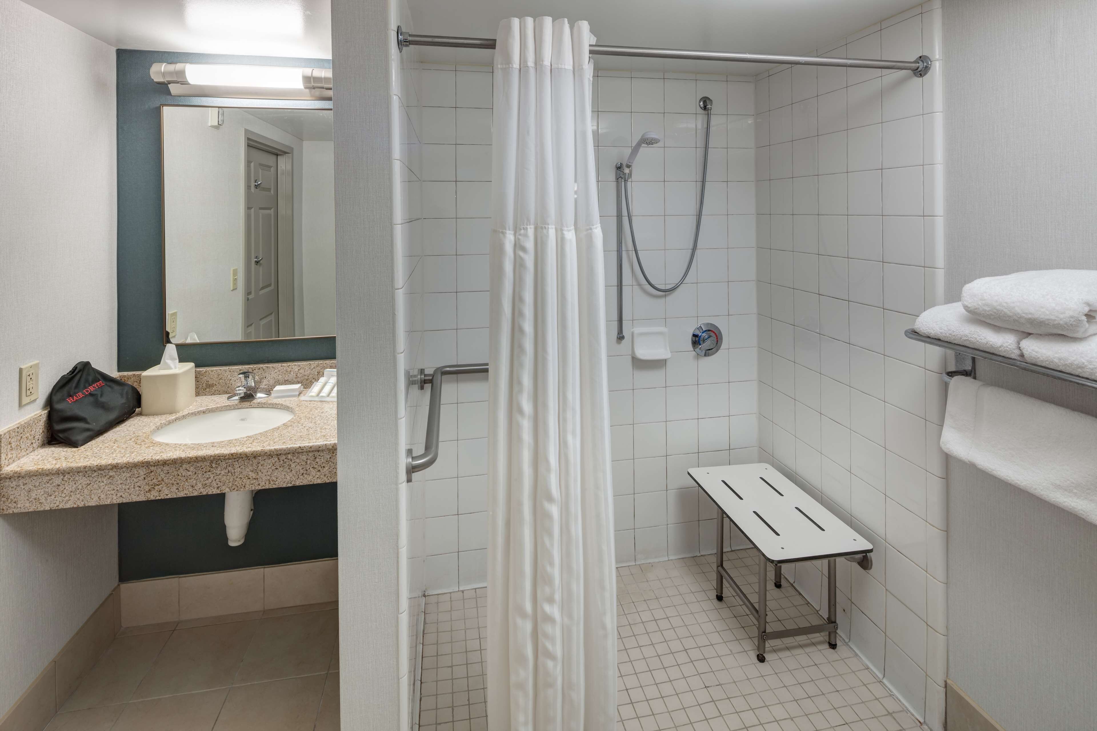 room | bathroom | combined shower/bathtub, designer toiletries, hair dryer, towels