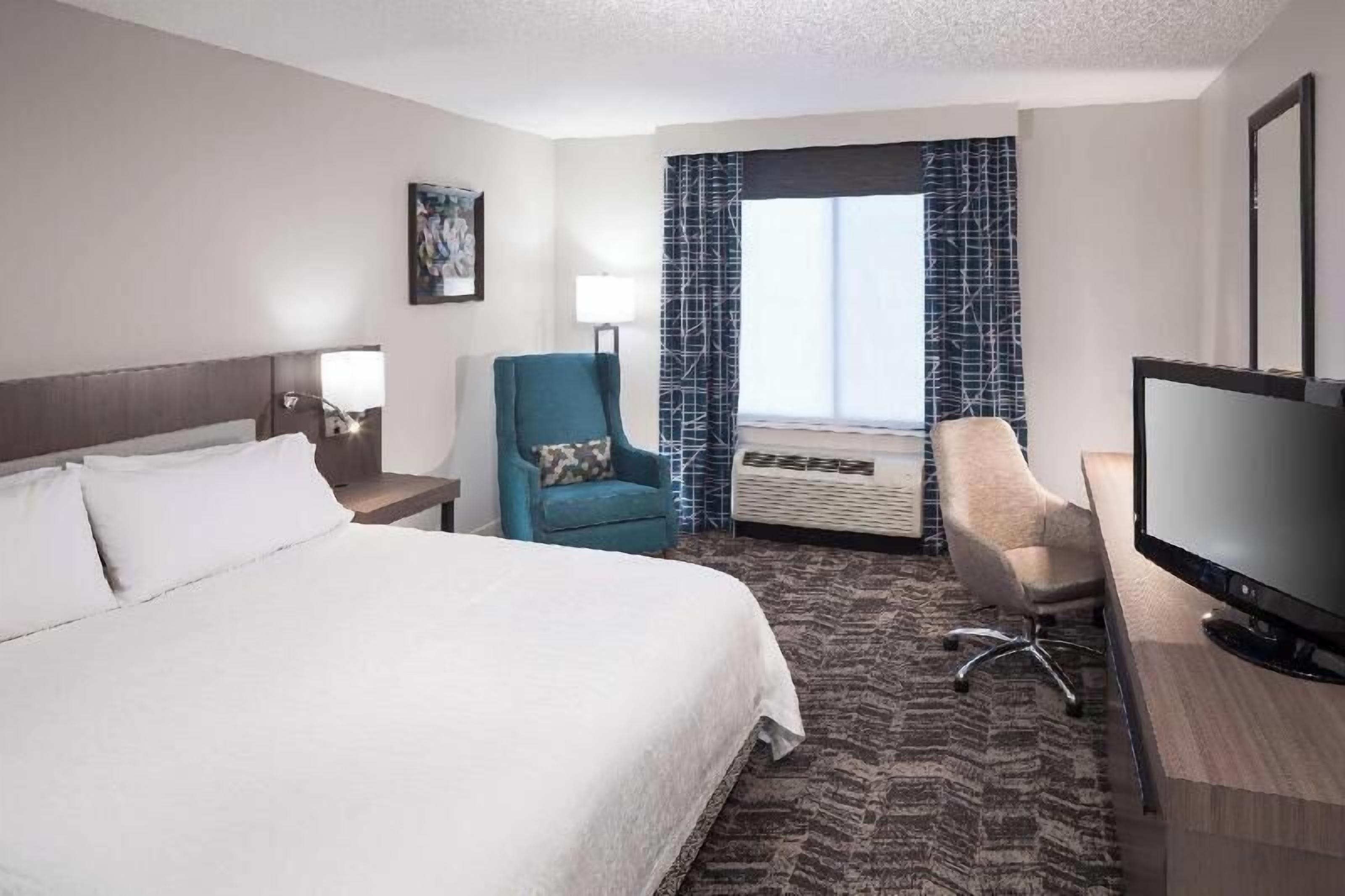 Premium bedding, pillow-top beds, in-room safe, desk