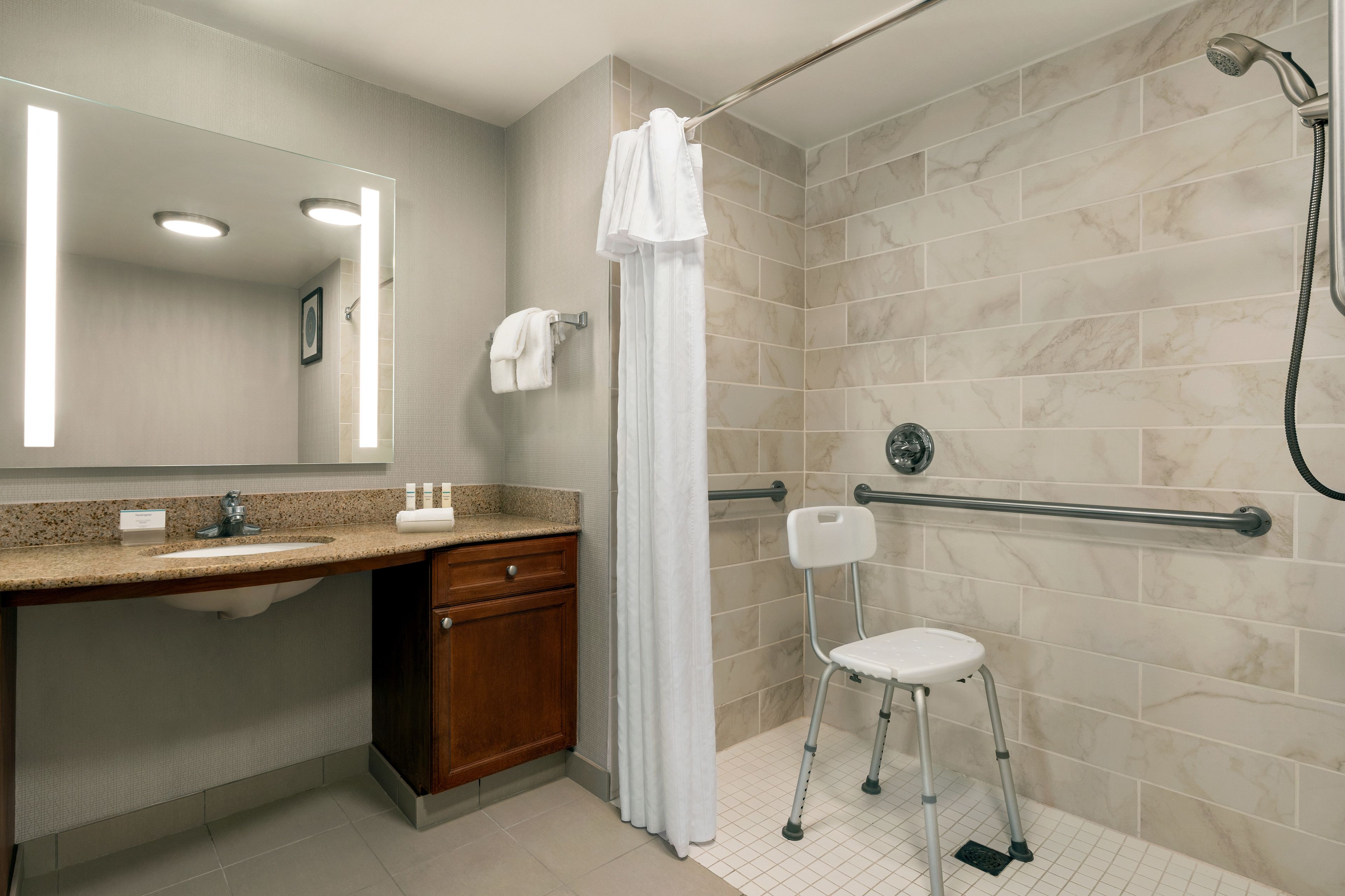 combined shower/bathtub, free toiletries, hair dryer, towels