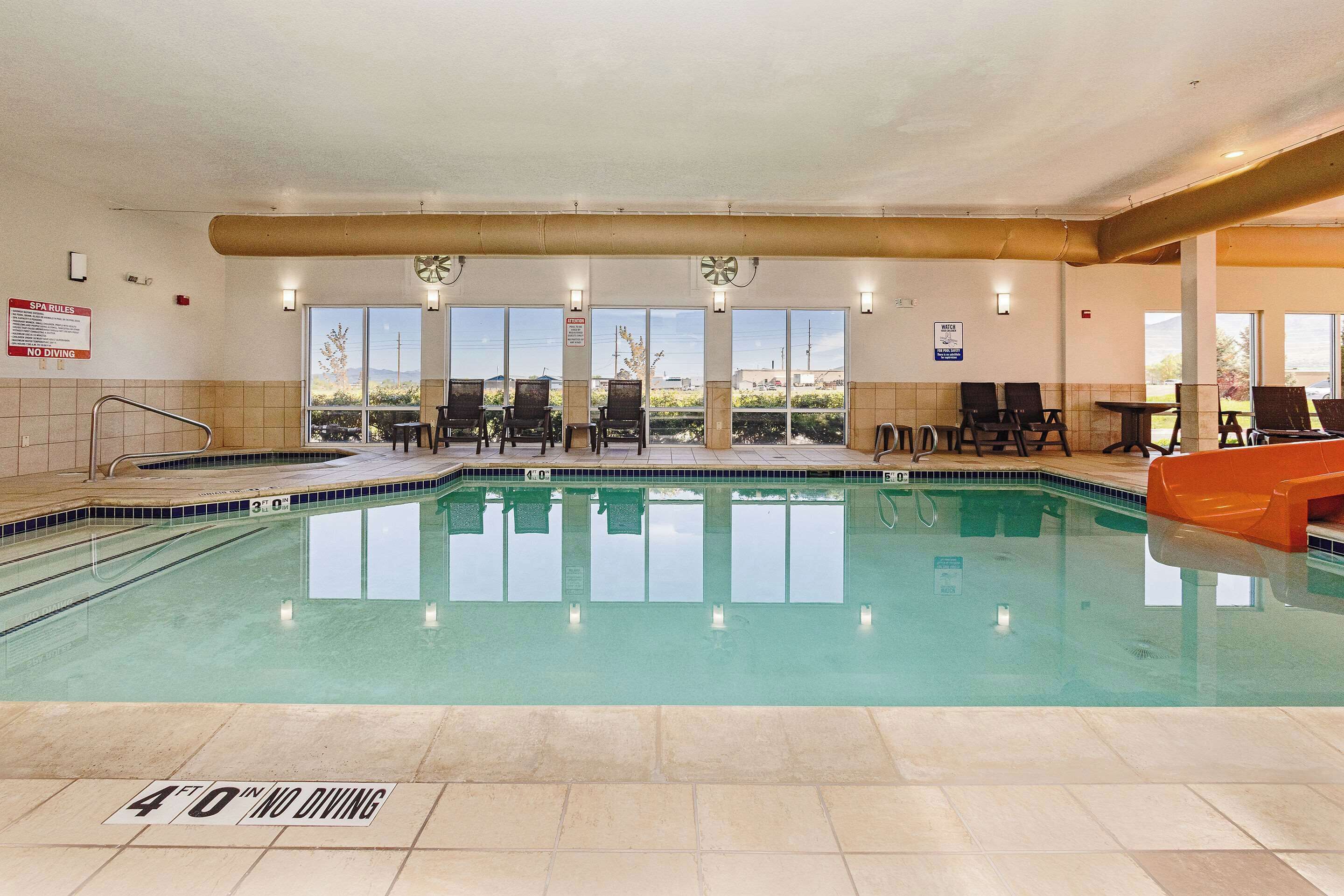 indoor pool, open 8:00 am to 10:00 pm, pool loungers