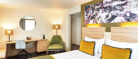 Habitación superior | Ropa de cama de alta calidad y minibar