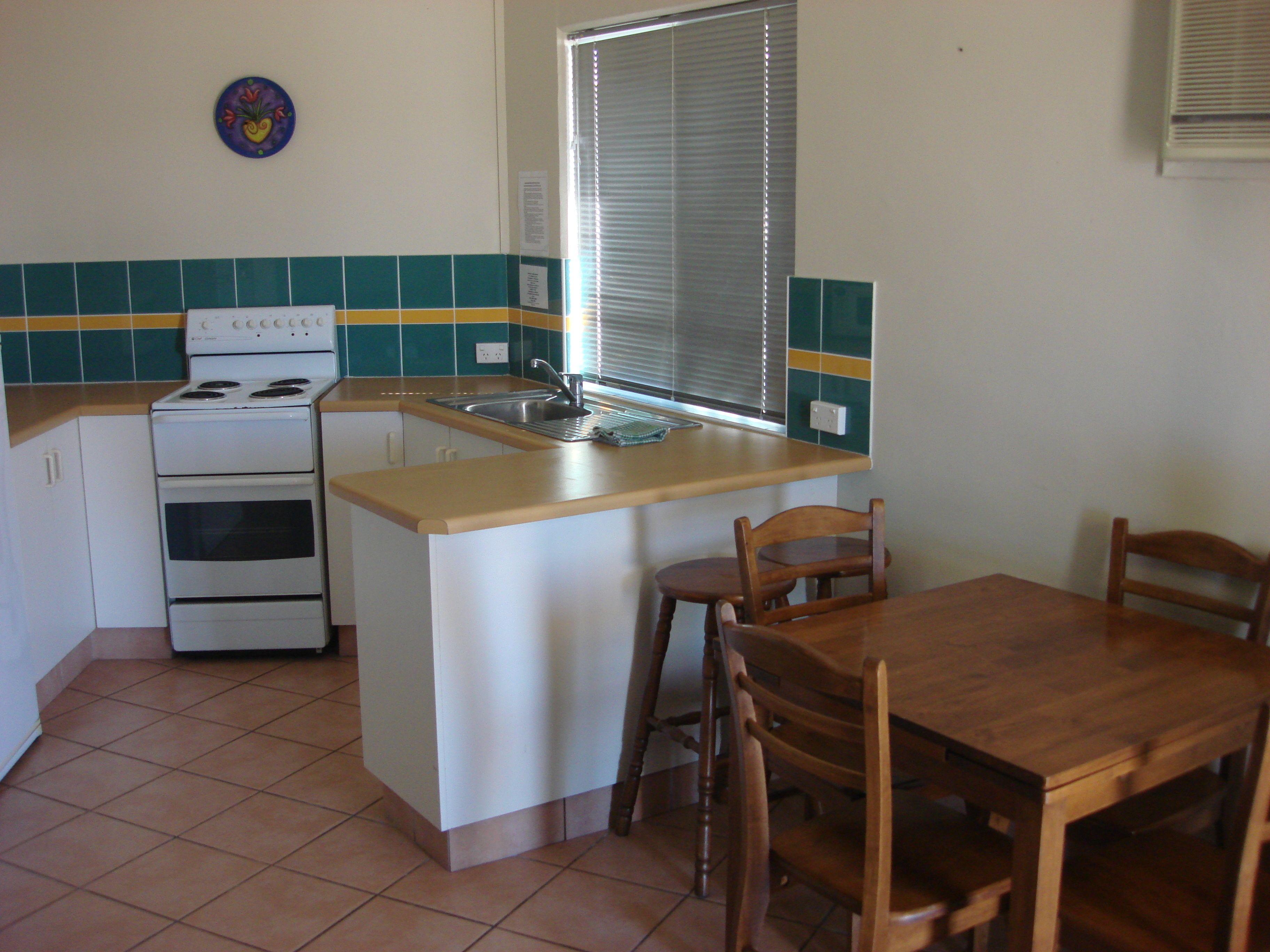 standard garden villa | private kitchen | full-sized fridge, microwave, oven, stovetop