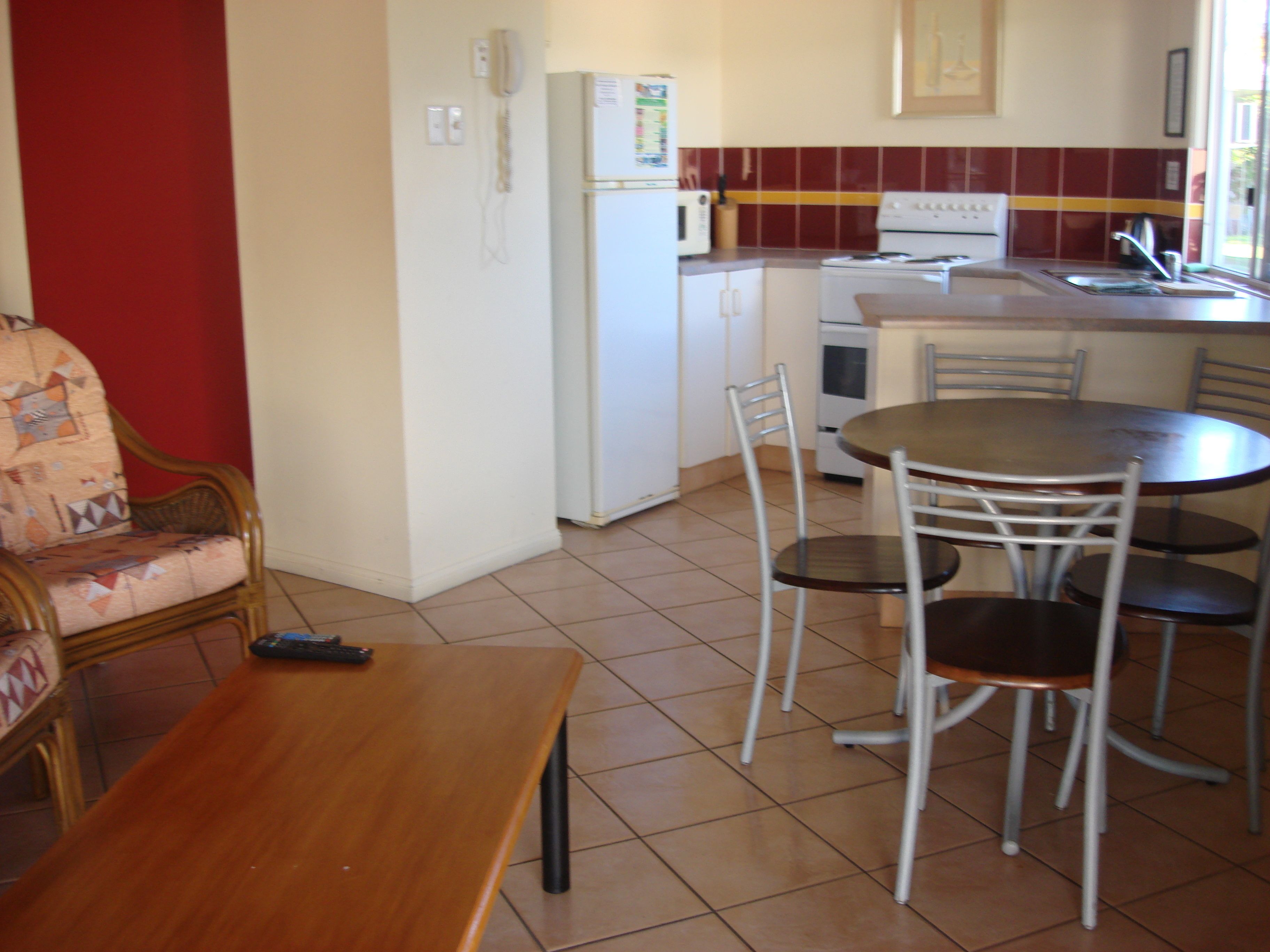 standard pool villa | private kitchenette | full-sized fridge, microwave, oven, stovetop