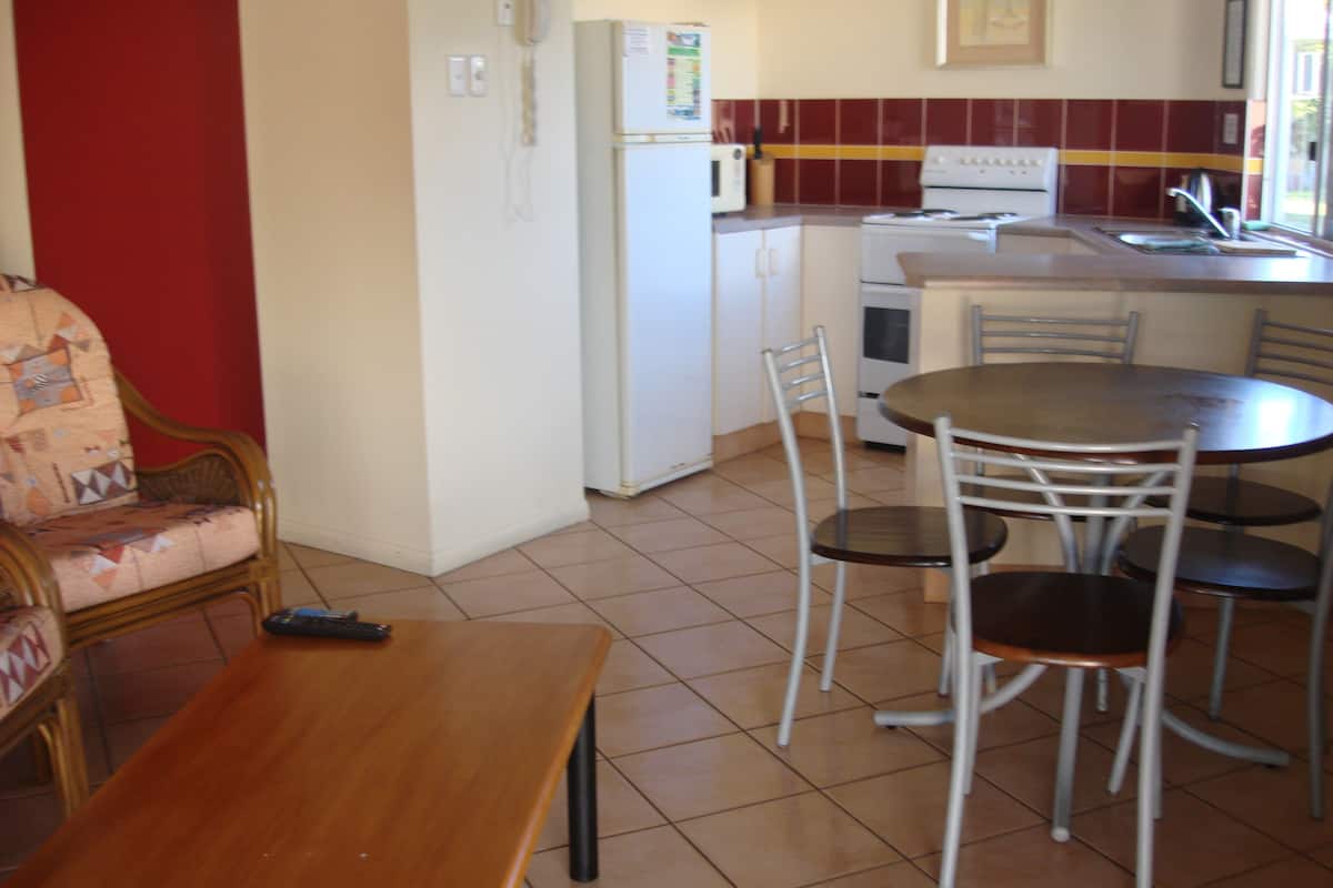 standard pool villa | private kitchenette | full-sized fridge, microwave, oven, stovetop