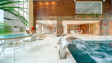 Indoor pool, open 10:00 AM to 10:00 PM, pool loungers