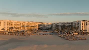 On the beach, beach cabanas, sun loungers, beach umbrellas