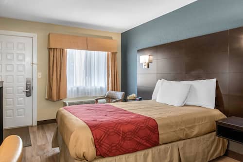 Habitación estándar, 1 cama King size, para no fumadores | Escritorio, tabla de planchar con plancha, cunas y camas extra