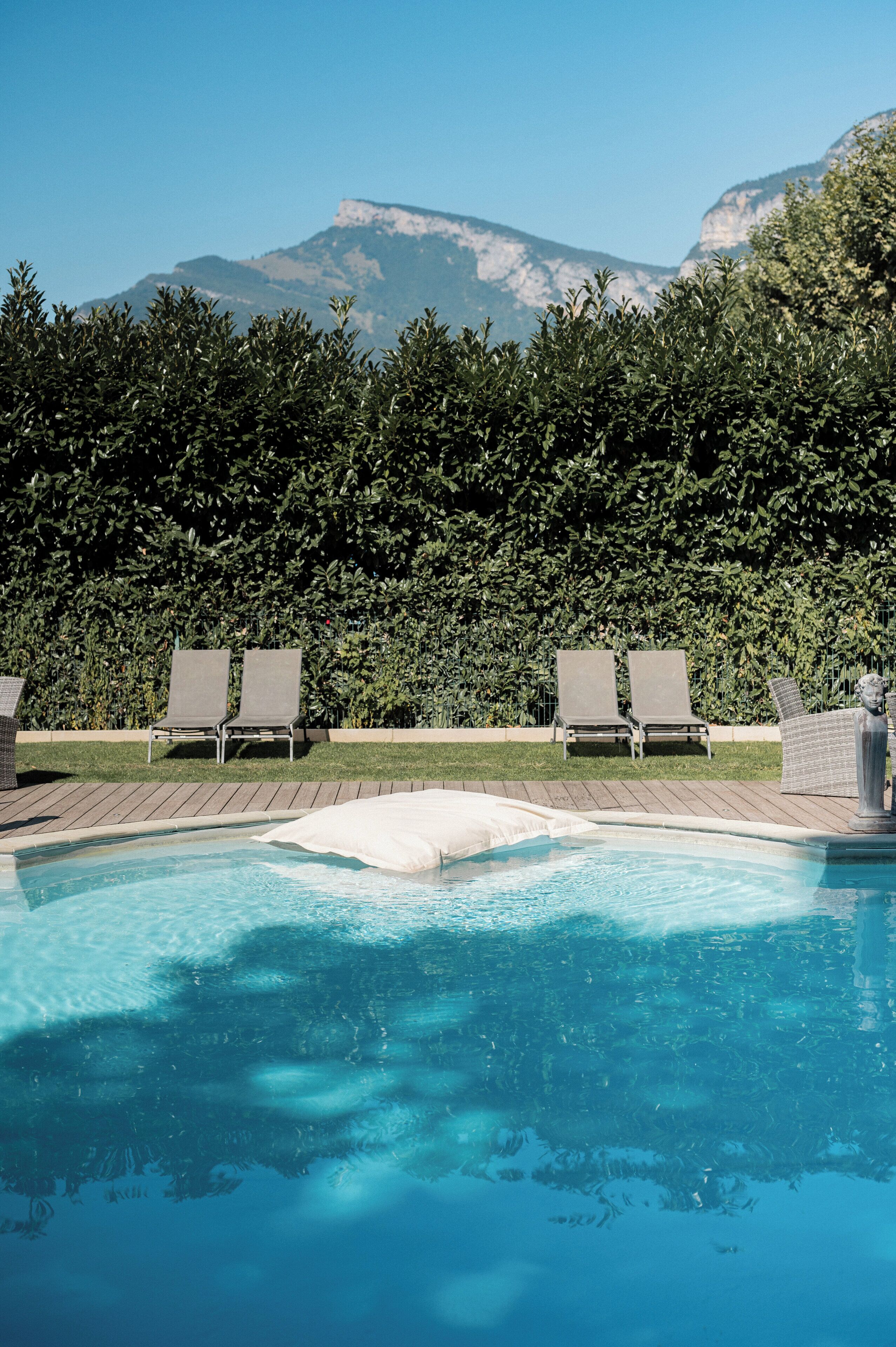 seasonal outdoor pool, pool umbrellas, pool loungers