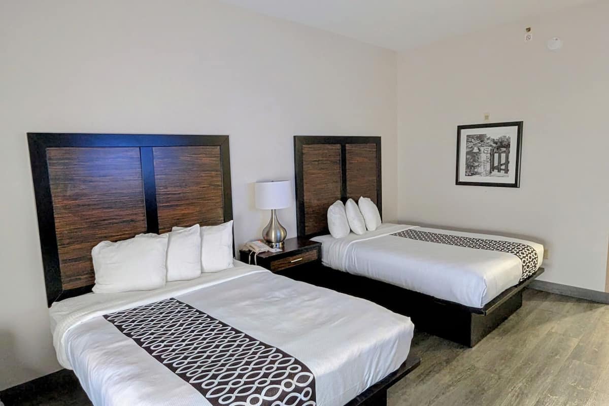 Room, 2 Queen Beds, Non Smoking | Premium bedding, desk, iron/ironing board, free cribs/infant beds